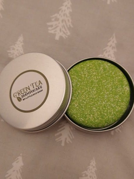 The Green Tea shampoo bar from My Little Eco Shop in an open tin.