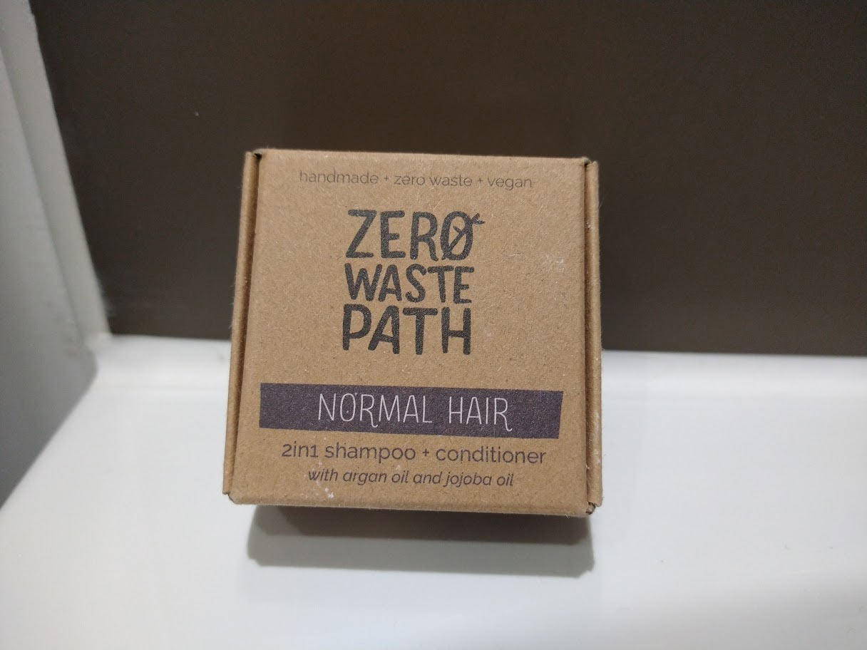 The Zero Waste Path shampoo bar's simplistic cardboard packaging.