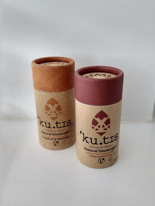 Two sticks of Kutis in cardboard tubes - Grapefruit & Mandarin, and Cedarwood & Rose.