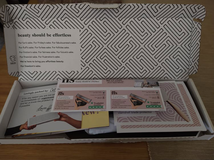 The FFS box, complete with funky black and white pattern and a lot of leaflets on top.