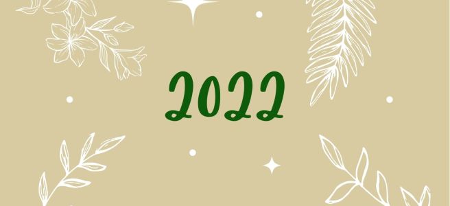 The outline of white leaves against a beige background, surrounding the word '2022'.