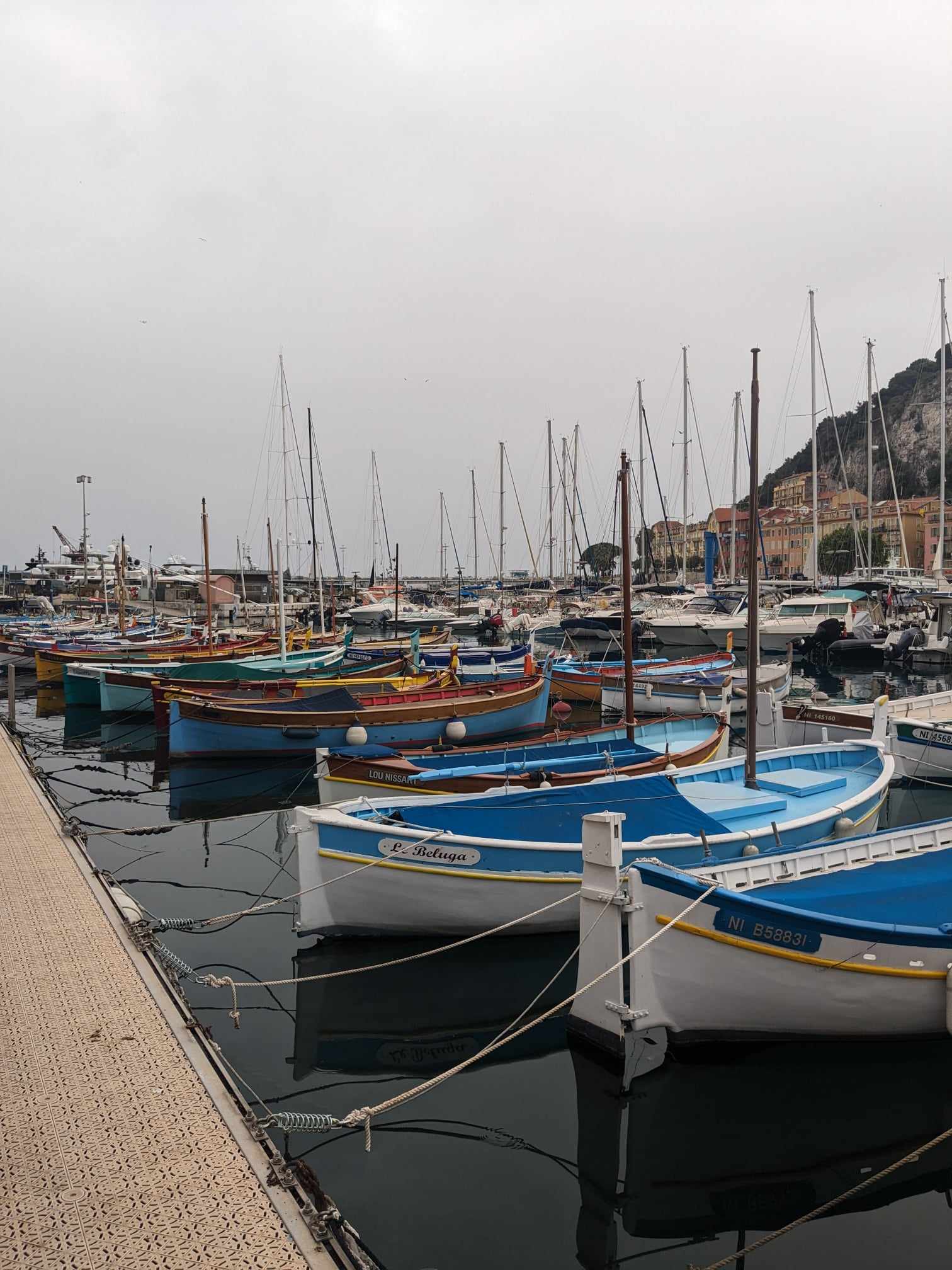 A row of colourful boats moored in Port Lympia, Nice.
