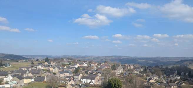 A view down into Middleton village against a blue sky backdrop.