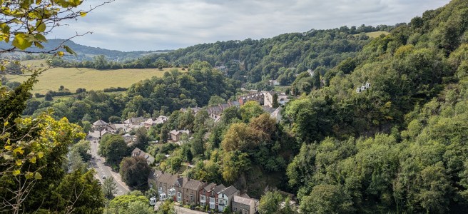 The view of Matlock Bath from High Tor, complete with cable cars travelling towards ground level.